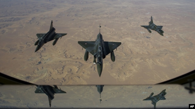 This picture released by the French Army Communications Audiovisual office shows French aircraft flying to N'Djamena overnight January 11 to 12, after taking off from Nancy.