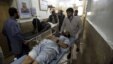 Một người đàn ông bị thương được đưa đi điều trị tại bệnh viện sau cuộc tấn công tự sát ở Asadabad, thủ phủ của tỉnh Kunar, Afghanistan ngày 27 tháng 2 năm 2016. 