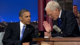 President Barack Obama talks with David Letterman on the set of the "Late Show With David Letterman" in New York, Sept. 18, 2012.  