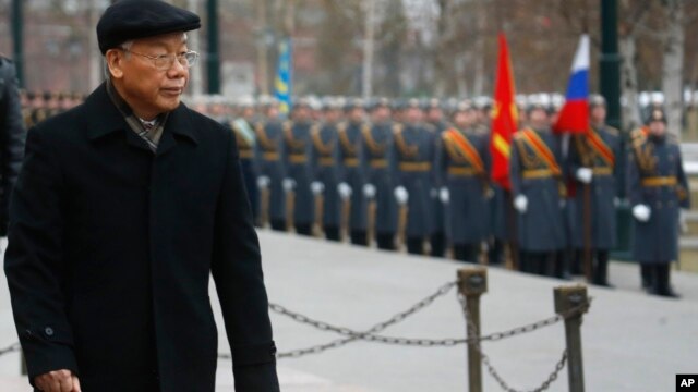 FILE - Vietnamese Communist Party General Secretary Nguyen Phu Trong attends a wreath-laying ceremony at the Tomb of the Unknown Soldier in Moscow, Nov. 24, 2014.