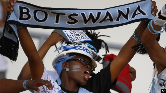 Botswana supporters cheer on their team during an African Cup of Nations soccer match in Libreville, Gabon, Wednesday, Feb. 1, 2012.