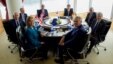 U.S. Secretary of State John Kerry, center left at back, begins the first working session of the G-7 Ministerial meeting with colleagues from Canada, the European Union, France, Germany, Italy, Japan and Britain at the Grand Prince Hotel in Hiroshima, Japan, April 10, 2016.