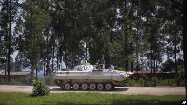 A UN Organization Stabilization Mission in DRC, MONUSCO, armored vehicle drives through Rutshuru, under control of M23 rebels, north of Goma, August 4, 2012.