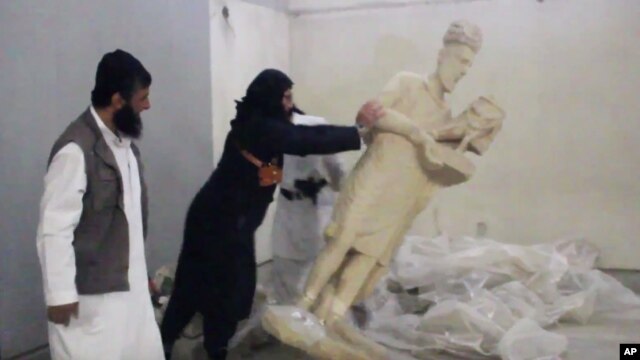 A five-minute video from the Islamic State group purports to show militants destroying ancient artifacts in Iraq’s Mosul Museum. It was released Feb. 26, 2015.