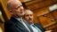 British Foreign Secretary William Hague speaks as Jordanian Foreign Minister Nasser Judeh (R) listens during their joint news conference before a meeting of the Friends of Syria alliance in Amman, May 22, 2013. 
