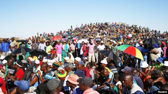 Striking miners evicted from company housing at a gold mine occupy a hill near the mine in Carltonville, west of Johannesburg October 2, 2012.