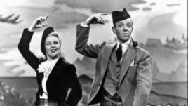 Ginger Rogers and Fred Astaire in a publicity photo for the movie musical "The Barkleys of Broadway"