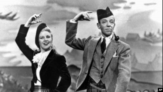 Ginger Rogers and Fred Astaire in a publicity photo for the movie musical "The Barkleys of Broadway"
