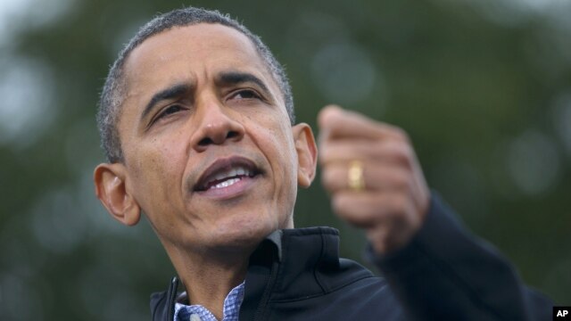 President Barack Obama speaks during a campaign event at Sloan's Lake Park in Denver, Colorado, Oct. 4, 2012. 
