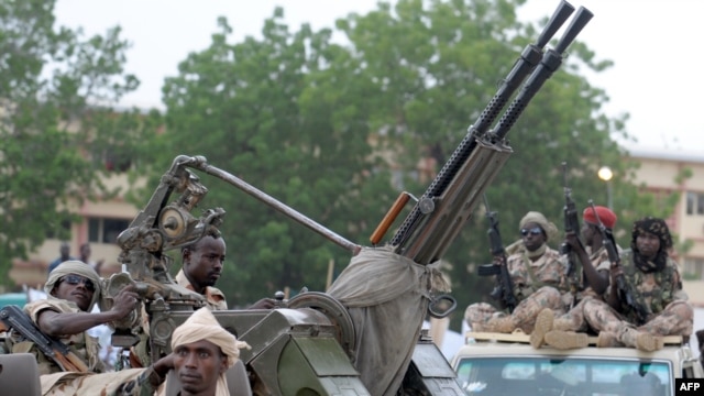 (FILES) A picture taken on June 21, 2008 shows Chadian soldiers parading in N'djamena.Rebels waging an offensive in the Central African Republic seized Kaga-Bandoro, another major town, on Dec. 25, 2012.