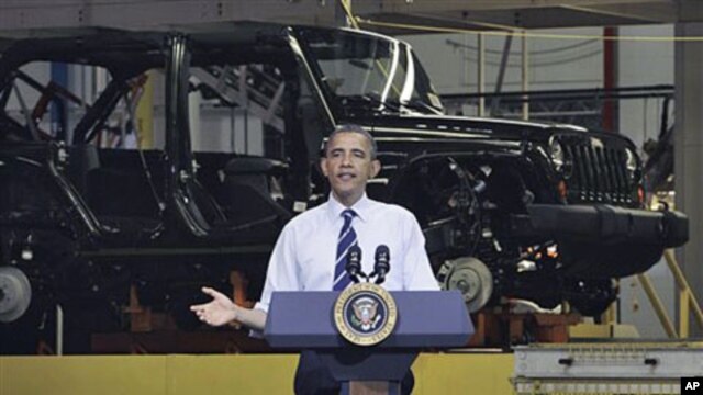 President Barack Obama speaks at Chrysler Group's Toledo Assembly complex in front of a Jeep Wrangler, in Toledo, Ohio, June 3, 2011