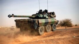A French tank is seen heading north at the tail end of military convoy in Gao, northern Mali, Feb. 6, 2013.