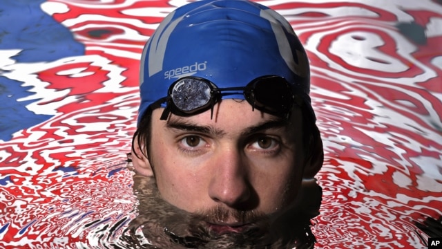 Olympic gold medalist Michael Phelps posing in the Belmont Plaza Olympic Pool in Long Beach, Calif. (Jan 2008 file photo)