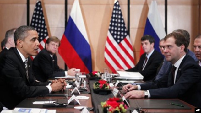 President Barack Obama meets with President Dmitry Medvedev of Russia on the sidelines of the APEC summit in Yokohama,  Japan, Sunday, Nov. 14, 2010.
