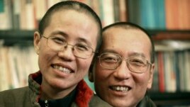Bà Lưu Hà và chồng, Khôi nguyên giải Nobel Hòa Bình Lưu Hiểu Ba.