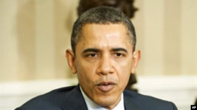 US President Barack Obama speaks during a meeting with Australian Prime Minister Julia Gillard (not seen) in the Oval Office of the White House in Washington, DC, March 7, 2011
