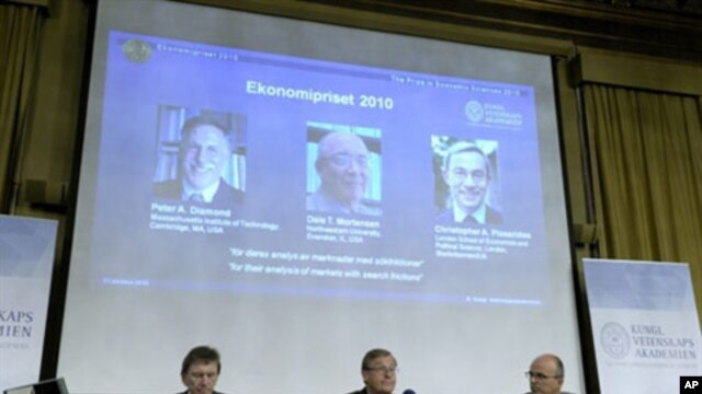 Seated, from L-R:  Professor Bertil Holmlund, Permanent secretary of the Royal Academy of Sciences Staffan Normark (C) and Professor Per Krusell announce the Nobel Prize in Economic Sciences. Stockholm, 11 Oct 2010