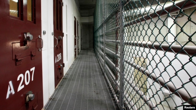 The interior of an unoccupied communal cell block is seen at Camp VI, a prison used to house detainees at the U.S. Naval Base at Guantanamo Bay March 5, 2013. 