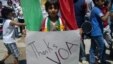 A Syrian Kurdish child at a protest rally holds a poster thanking Voice of America’s Kurdish Service for its coverage of the uprising in Syria. 