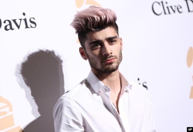 Zayn Malik arrives at the 2016 Clive Davis Pre-Grammy Gala at the Beverly Hilton Hotel, Feb. 14, 2016, in Beverly Hills, California.