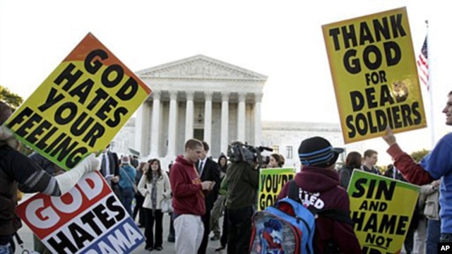 Members of the Westboro Baptist Church picket in front of the Supreme Court in Washington,  06 Oct 2010