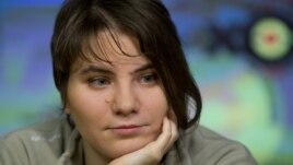 Yekaterina Samutsevich, a member of anti-Kremlin punk feminist band Pussy Riot, who was given a suspended sentence and freed this week by an appeals court, gives an interview in Moscow, October 12, 2012.