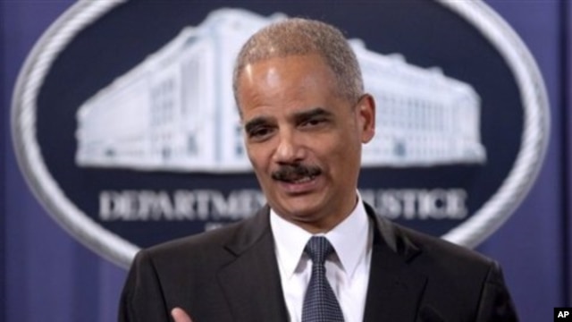 Attorney General Eric Holder takes part in a news conference at the Justice Department in Washington, 06 Dec 2010