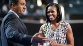 First Lady Michelle Obama on stage with actor Kal Penn at the Democratic National Convention inside Time Warner Cable Arena in Charlotte, N.C., on Monday, Sept. 3, 2012.