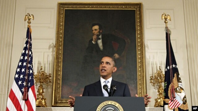 President Barack Obama speaks in the State Dining Room of the White House,  Aug. 8, 2011
