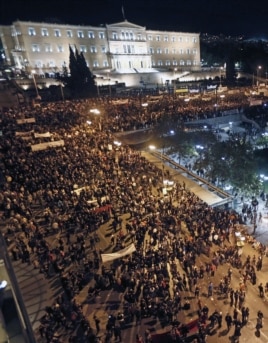 Greek protestors gather in front of the parliament in Syntagma square during a 48-hour strike by the two major Greek workers unions in central Athens, November 7, 2012.
