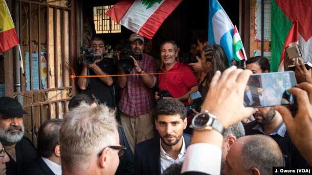Kassem Istanbouli, center, at the re-opening of Stars Cinema was also the start of the Lebanon International Theatre Festival attracted locals and media alike.