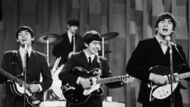 The Beatles perform on the CBS "Ed Sullivan Show" in New York on Feb. 9, 1964.