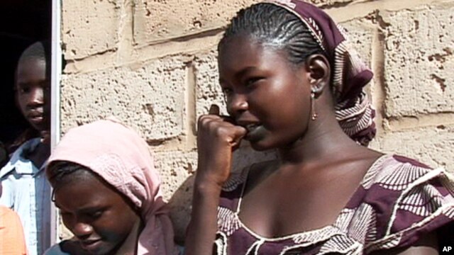 Twelve-year-old Ramata Barry was married to a man in her village this year. She hopes to stay in school.