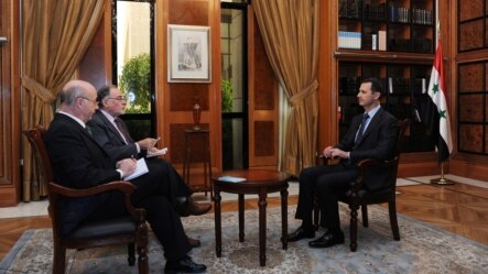 Suriya prezidenti Bashar Assad argentinalik jurnalistlar bilan, 18-may, 2013-yil.