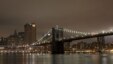 The Brooklyn Bridge is seen before the lights are turned off, in participation with Earth Hour, in New York March 31, 2012. Lights started going off around the world on Saturday in a show of support for renewable energy. REUTERS/Allison Joyce (UNITED STAT