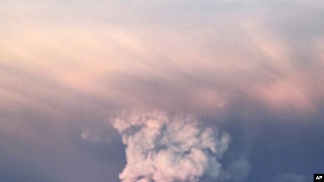 Smoke plumes from the Grimsvotn volcano, which lies under the Vatnajokull glacier, about 120 miles, (200 kilometers) east of  Rejkjavik,  May 23, 2011