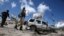 Tarkacen wasu daga cikin motocin da harin birnin Mogadishu ya rutsa da su.