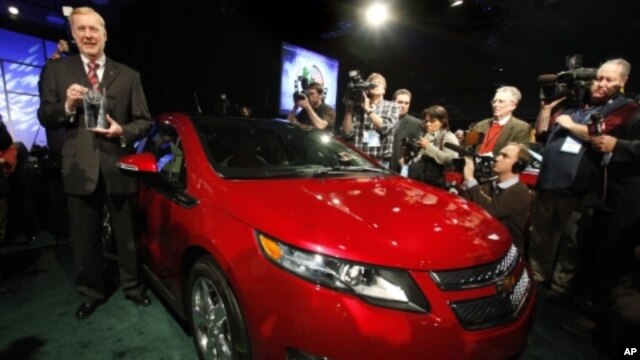GM's Thomas Stephens accepts the North American Car of the Year Award for the Chevrolet Volt at the North American International Auto Show in Detroit, Michigan on Jan. 10, 2011.