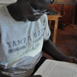 Esther Bagirasas, who plays the queen, learning her lines, Juba, South Sudan, April 4, 2012.