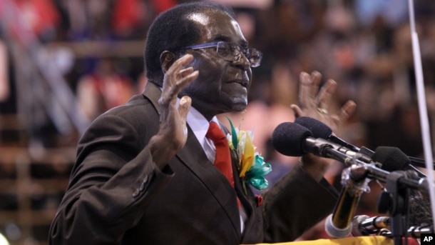 FILE - Zimbabwean President Robert Mugabe attends a meeting with the country's war veterans in Harare, April, 7, 2016.