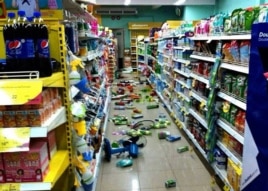 Goods at a grocery store that have fallen from shelves litter the floor after an earthquake in Chiang Rai province, northern Thailand, on May 5, 2014.