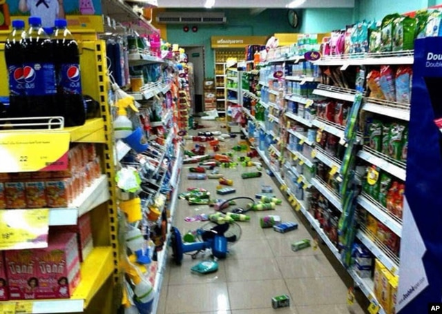 Goods at a grocery store that have fallen from shelves litter the floor after an earthquake in Chiang Rai province, northern Thailand, on May 5, 2014.