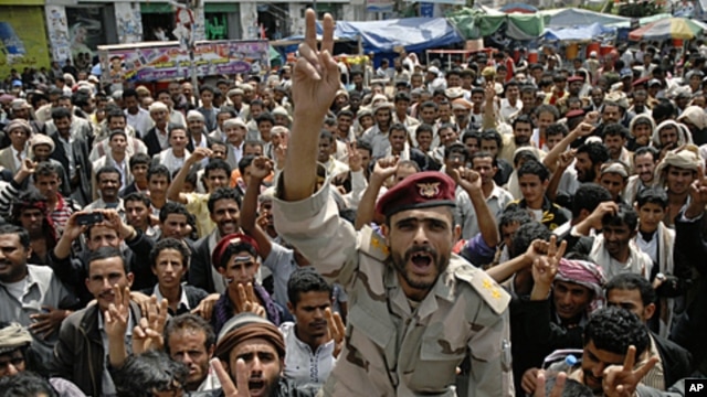 A former army officer, who defected to join anti-government protesters, shouts slogans during a rally demanding the ouster of Yemen's President Ali Abdullah Saleh in Sana'a October 4, 2011.