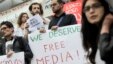 People attend a rally to mark World Press Freedom Day in Tbilisi.  (File)  