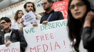 People attend a rally to mark World Press Freedom Day in Tbilisi.  (File)  