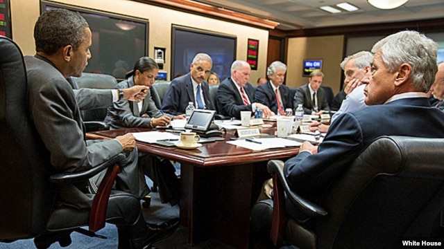 President Barack Obama meets with members of his national security team to discuss the situation in Egypt, in the Situation Room of the White House, July 3, 2013.