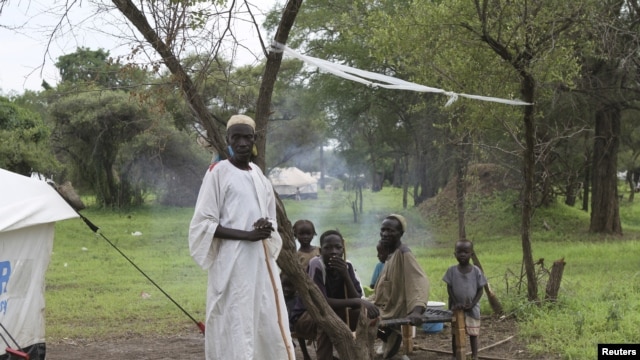A refugee family from Sudan, having newly resettled in Gendrassa camp in Maban, Upper Nile State, South Sudan, on the border with Sudan, is seen August 2, 2012. 
