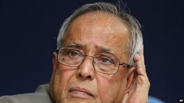 Indian Finance Minister Pranab Mukherjee listens to a question during a press conference in New Delhi, India, 25 Jan 2011