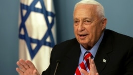 In this file photo taken on Monday, Nov. 21, 2005, Israeli Prime Minister Ariel Sharon speaks during a press conference at his Jerusalem office.