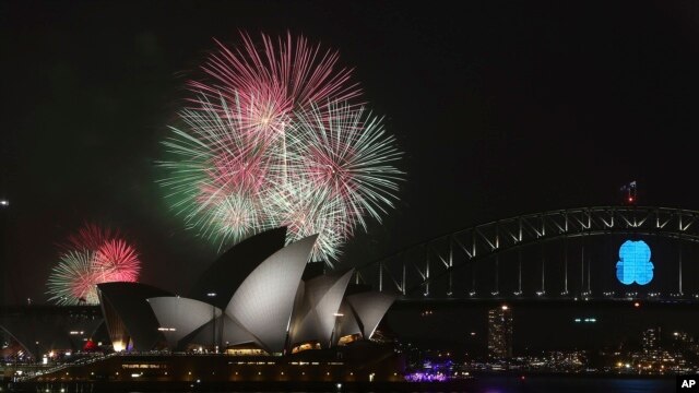 Fireworks over the Opera House and the Harbour Bridge in Sydney